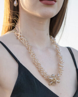 a woman wearing a necklace